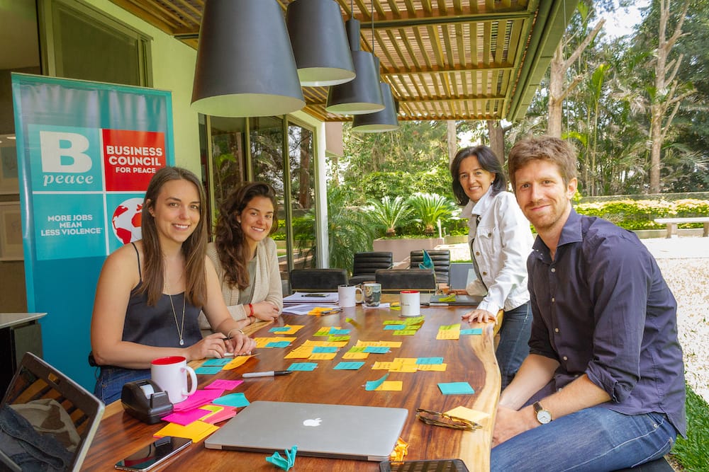 bpeace group at table