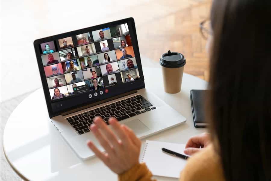 woman working on laptop video call